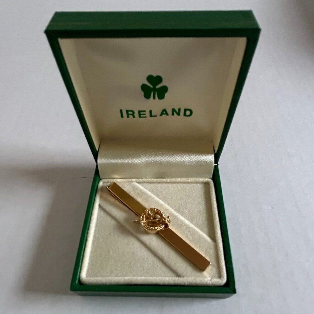 Gold tone tie clip with Celtic Sword design in original green hinged box